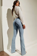 Calça Jeans Flare Modeladora Revolucionária Cós Super Alto Barra Corte a Laser Clara